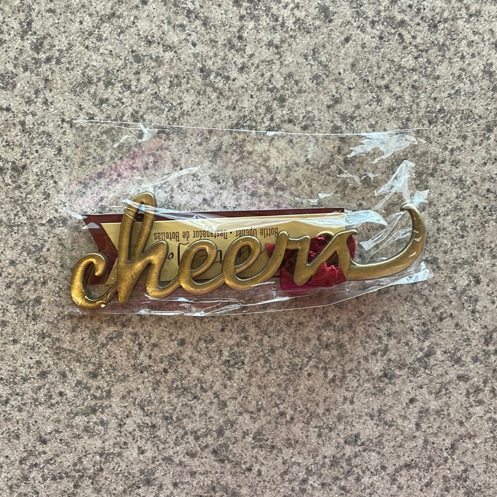 “Cheers” metal bottle opener